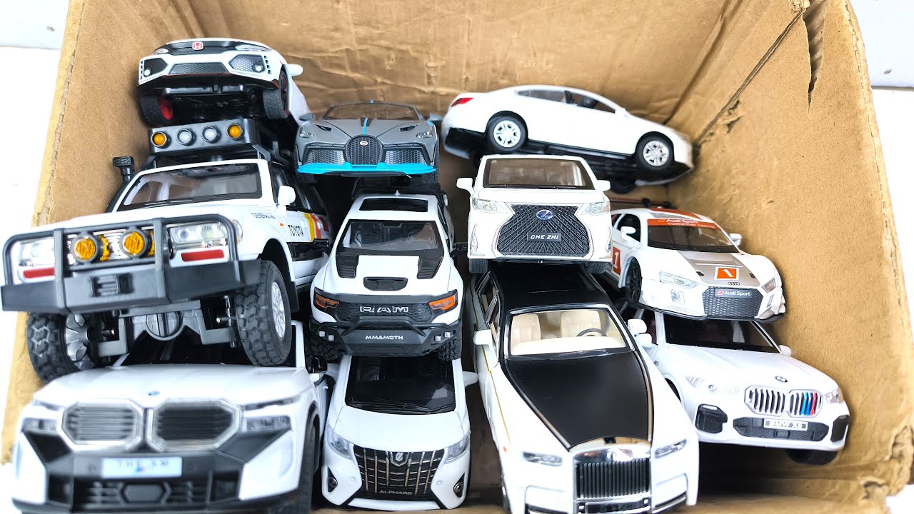 Box Full of Model Cars -Mazda Mx5, Koenigesgg Jesko, Lamborghini Scv12, Byd Yang Wang U8, Toyota Car