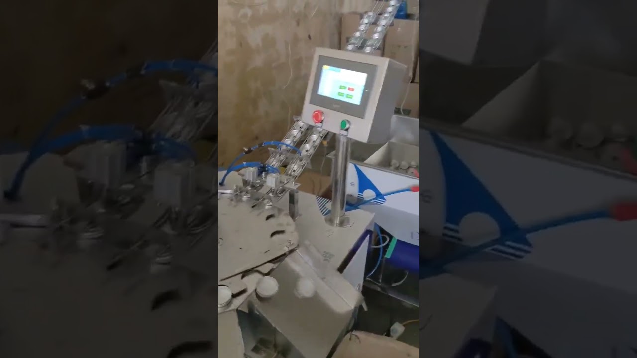 Rotary dual head aluminum cap wadding machine