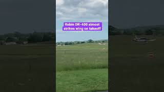 Robin DR-400 almost strikes wing on takeoff