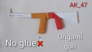 Tutorial On How To Make An Easy Paper Origami Gun Without Using Glue To Playorigami Crafts