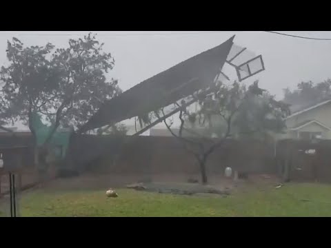 Backyard fence torn apart by Hurricane Hanna