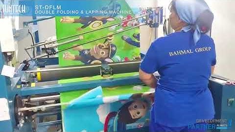 Suntech fabric double folding and lapping machine (folded on paper or wood board))