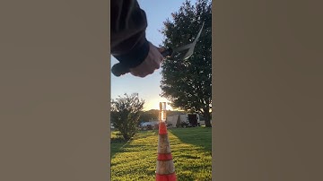 Razor Sharp Axe Bottle Cutting