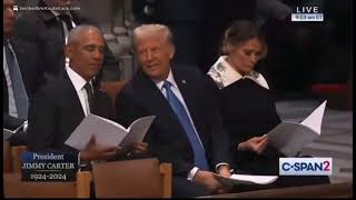 Michelle Obama’s Absence at Jimmy Carter’s Funeral a Mystery as Barack and Donald Hit It Off