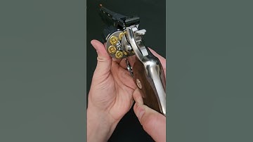 Leather holster on a 6 inch python #colt #guns #shorts