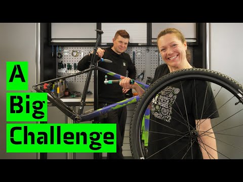 Teaching Vicki to build her bike.