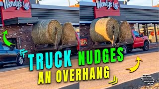 Loaded Truck Nudges a Restaurant Overhang with Hay Bails