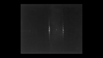 transfer of a levitated nanoparticle between two optical tweezers