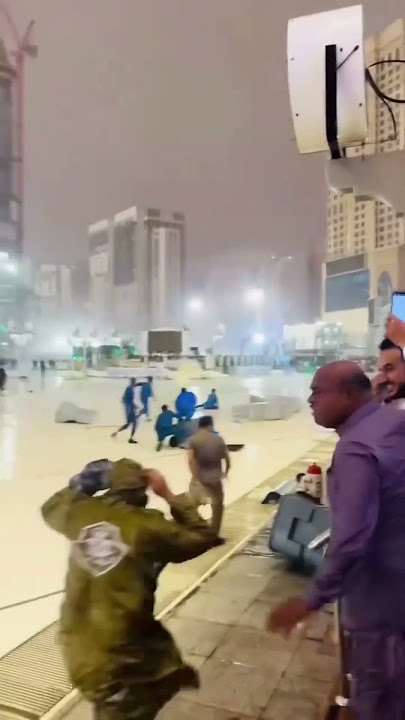 MECCA DROPPED BY LIGHTNING STORM, PEOPLE FLY