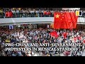 Pro-China and anti-government protesters in musical standoff
