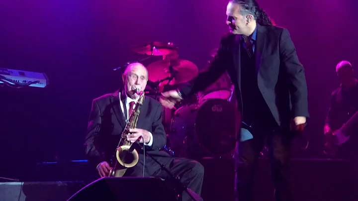 WW II veteran and sax player Pat DeRosa performing...