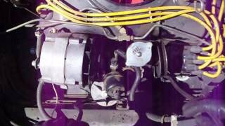 Changing a Corvair fan belt without tools.