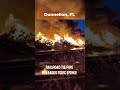 Massive pile of train ties burns in Florida, sending hazardous smoke into the air