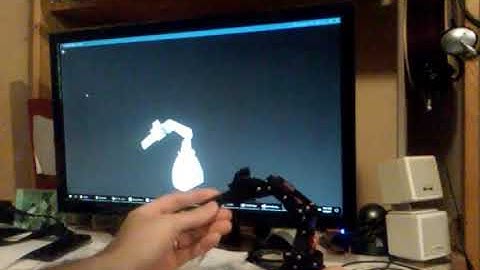 syncronized robot arm and simulator