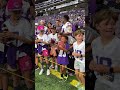 Kevin O'Connell gives football to young Vikings fan