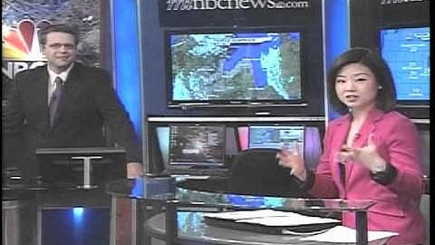 Studio light explodes and causes a fire during the newscast!