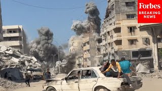 Camera Captures The Exact Moment An Israeli Strikes Hits A Building In Gaza