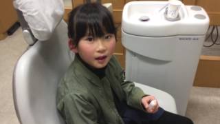 鼻うがい(ミサトールリノローション)をする8歳の女の子　大網白里市‐高井歯科医院