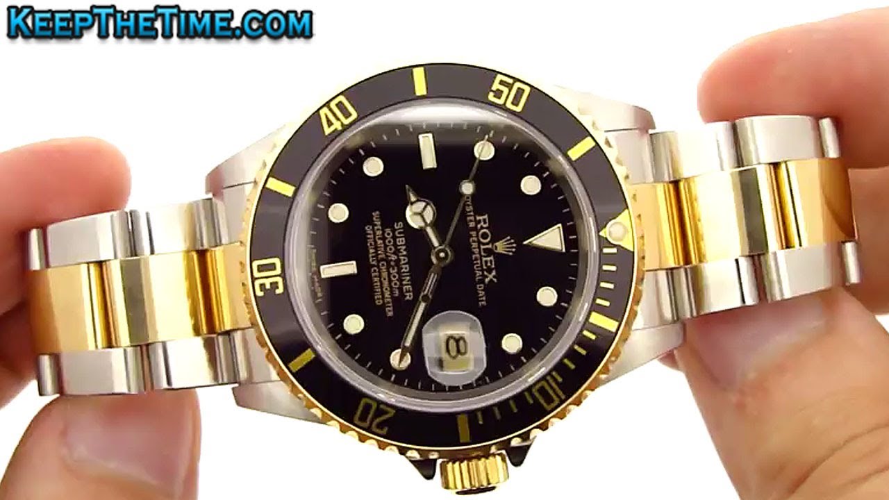 silver and gold submariner