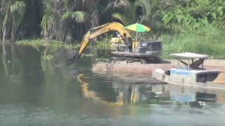 Excavator rowing Boat with He's A Pirate