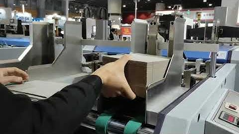 LS-1200B cardboad grooving machine running in exhibition