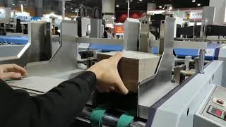 LS-1200B cardboad grooving machine running in exhibition