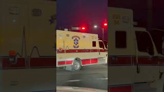 Escambia Medic laying on the airhorn