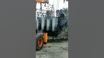 Lifting of a power transfermer in two hydra