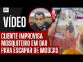 CLIENTE USA MOSQUITEIRO EM BAR PARA ESCAPAR DE INFESTAÇÃO DE MOSCAS