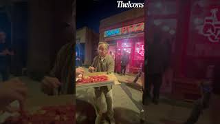 Jackie Chan Eats Pizza With Fans At Restaurant