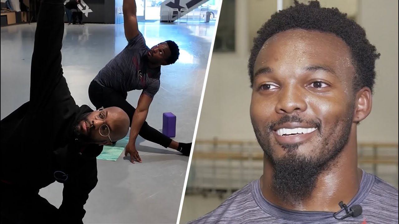 Nakobe Dean training at ballet studio to improve flexibility during rehab