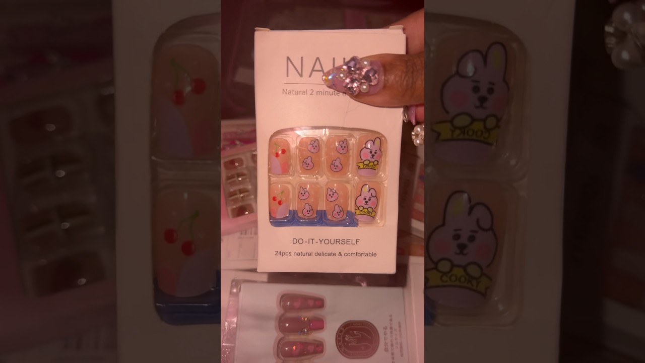 “Stunning BTS-Inspired Nail Art:BTS-themed nails done!   