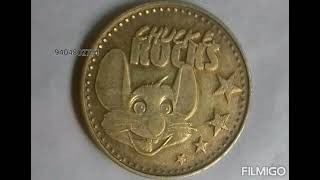 Token coin - Chuck E Cheese 2014 Chuck E Rocks * Electric guitar with logo and date.tering * USA Profile