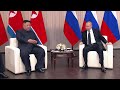 Putin and Kim shake hands at start of talks