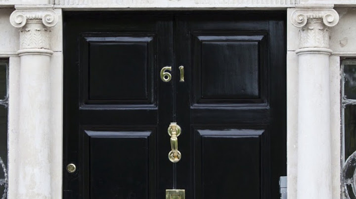 What color front door goes with a brown house