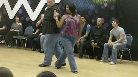 Mike Brenton and Maria Rodriguez dance together fo...