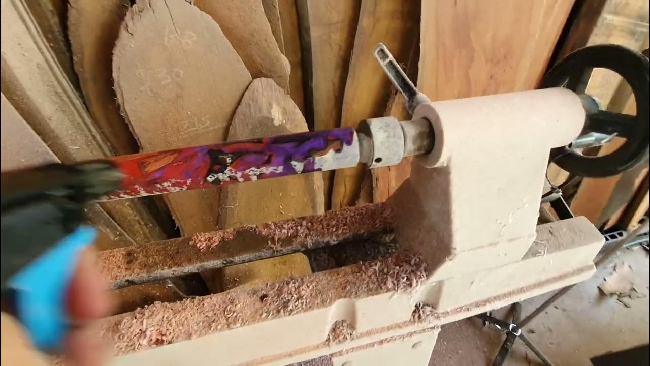 Making a custom Hybrid epoxy resin and hardwood pool cue. exposing the