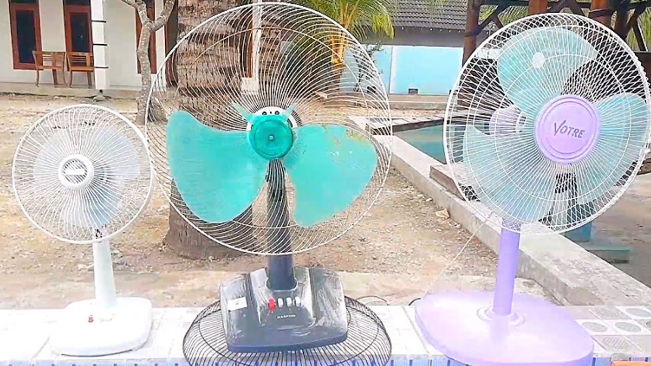 Kipas Angin Versus Kursi Goyang