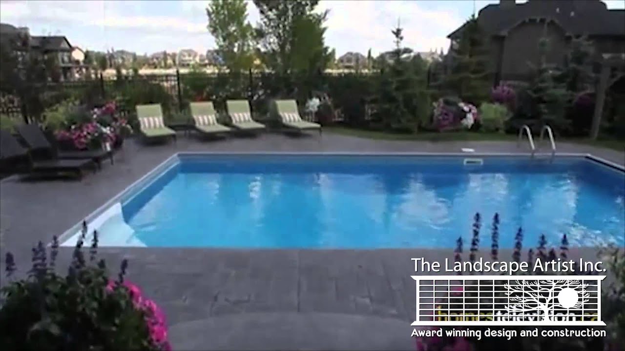 Feature backyard landscape design with a Pool  | Calgary Landscaping