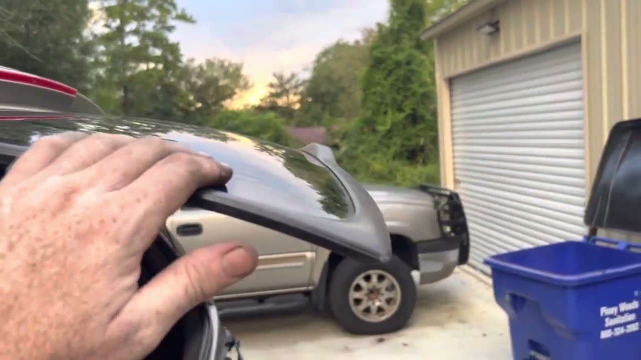 03 Tahoe gets a rear wing from an 07 Tahoe.