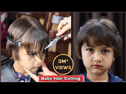 Asian baby girl do hair cut first time in hairdressing shop Stock Photo -  Alamy