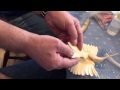 Carving a wooden Hummingbird
