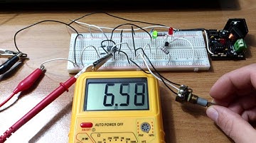 OP amp comparator for capacitor charger