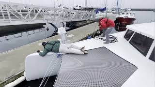 Neel 43 Trimaran springing off of dock