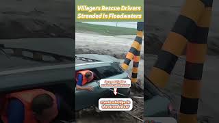 #Villagers rescue #drivers stranded in #floodwaters#FloodHeroes #VillageRescue #CommunityStrength