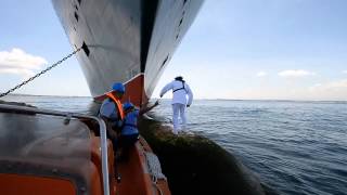 Behind The Scenes Queen Mary 2 Captain Photographed On The Bulbous Bow