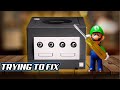 Trying to repair a nintendo gamecube  black screen  no disc spin