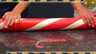 Hand Pulling a GIANT Candy Cane