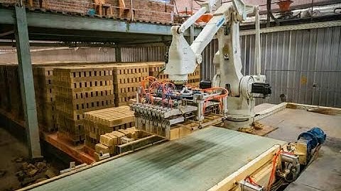 Robot setting bricks on tunnl kiln cart in tunnel kiln brick making project