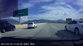 Police officer pulls over two speeding cars at the same time